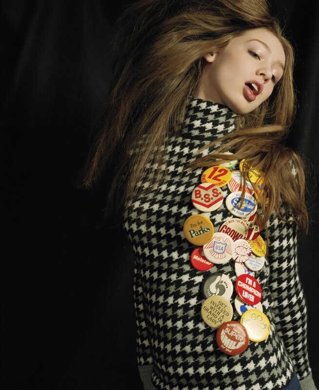 Woman with pins on sweater