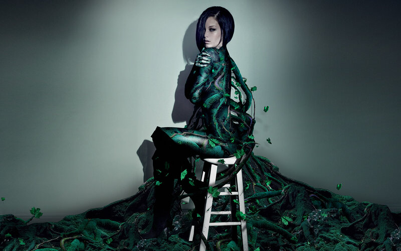 woman with plant-covered body