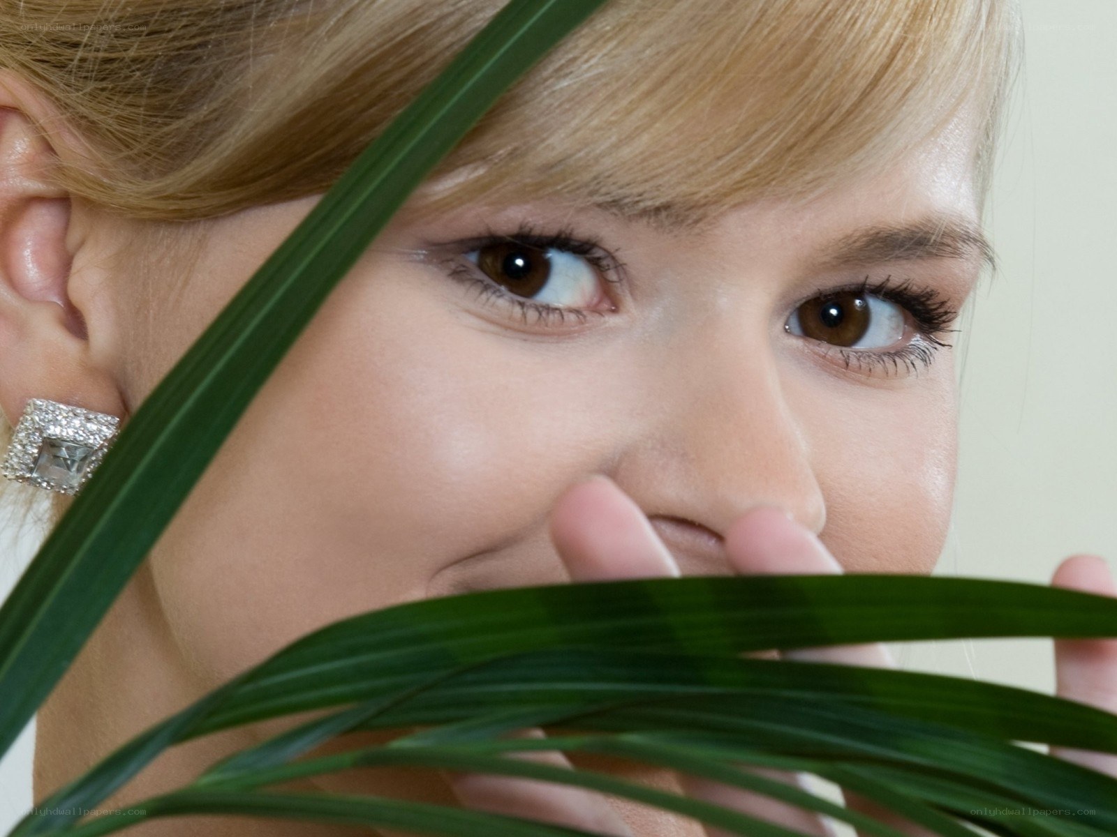 woman with plant leaf