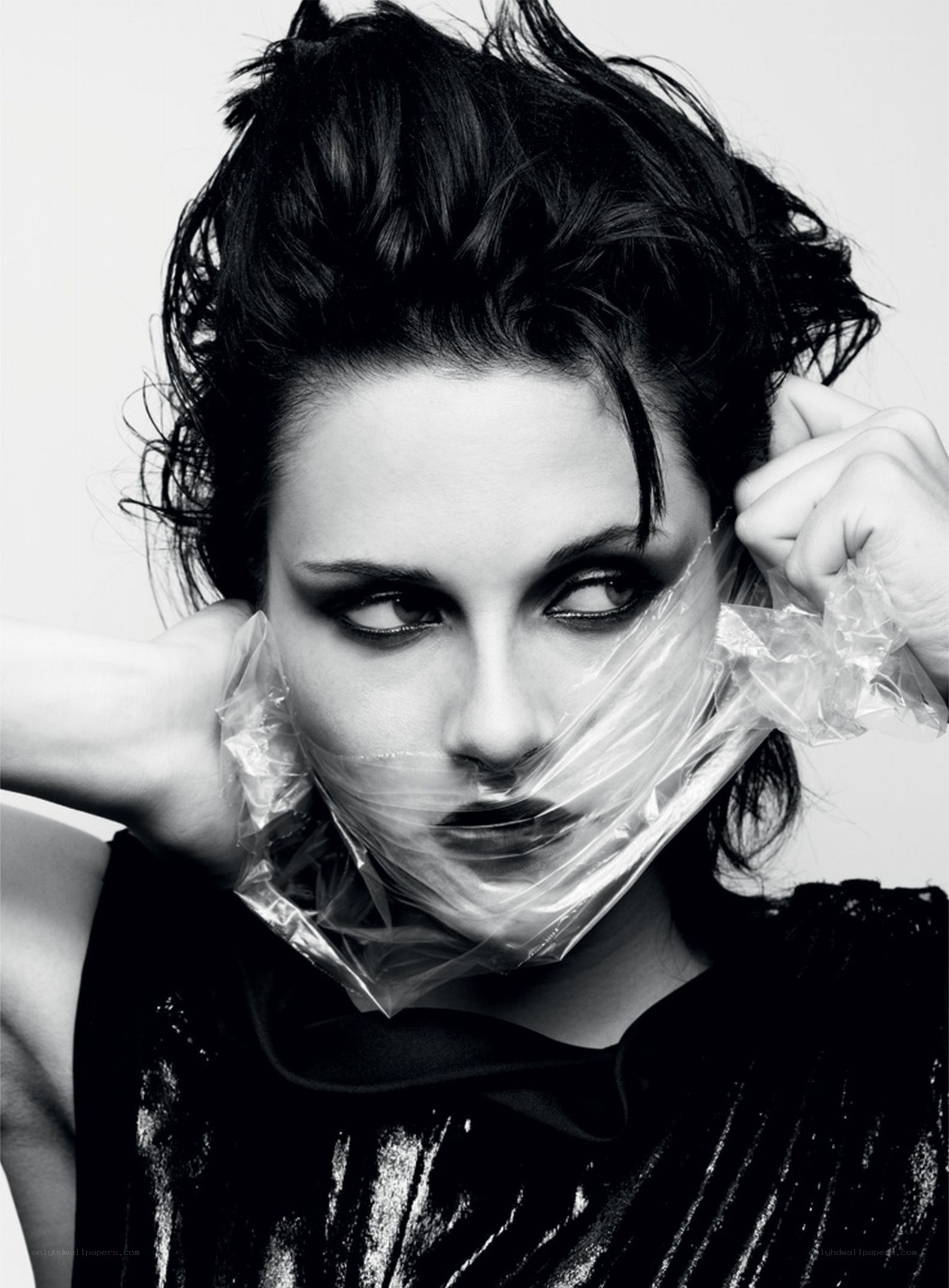 woman with plastic wrap on face