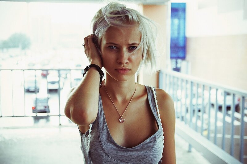 Woman with Platinum Hair — Gray