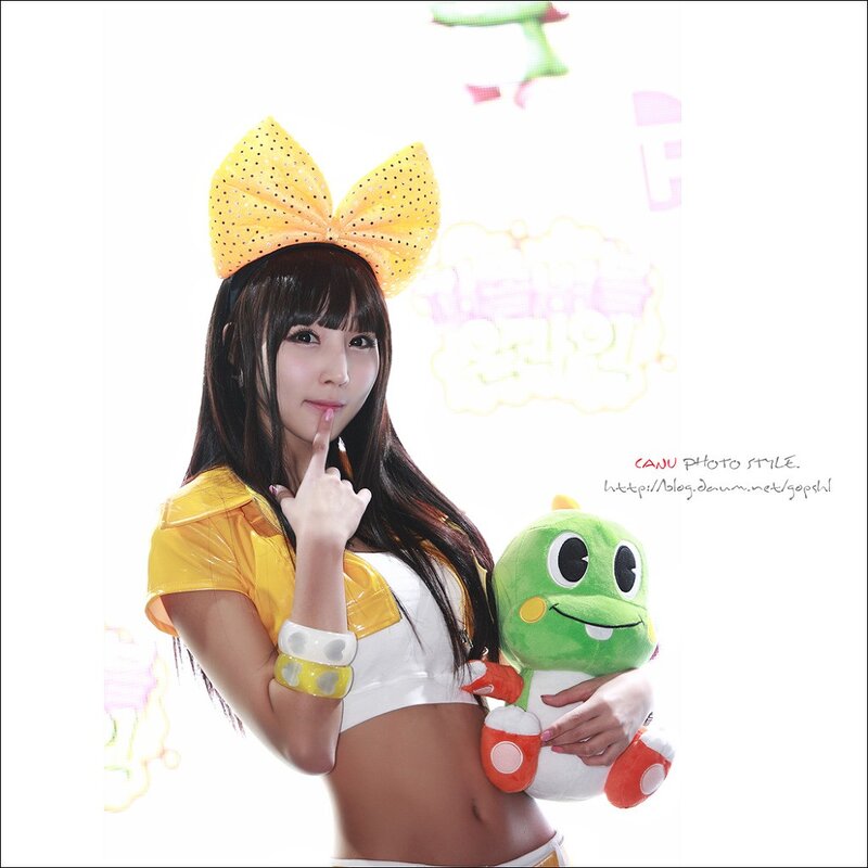 woman with plush toy and bow