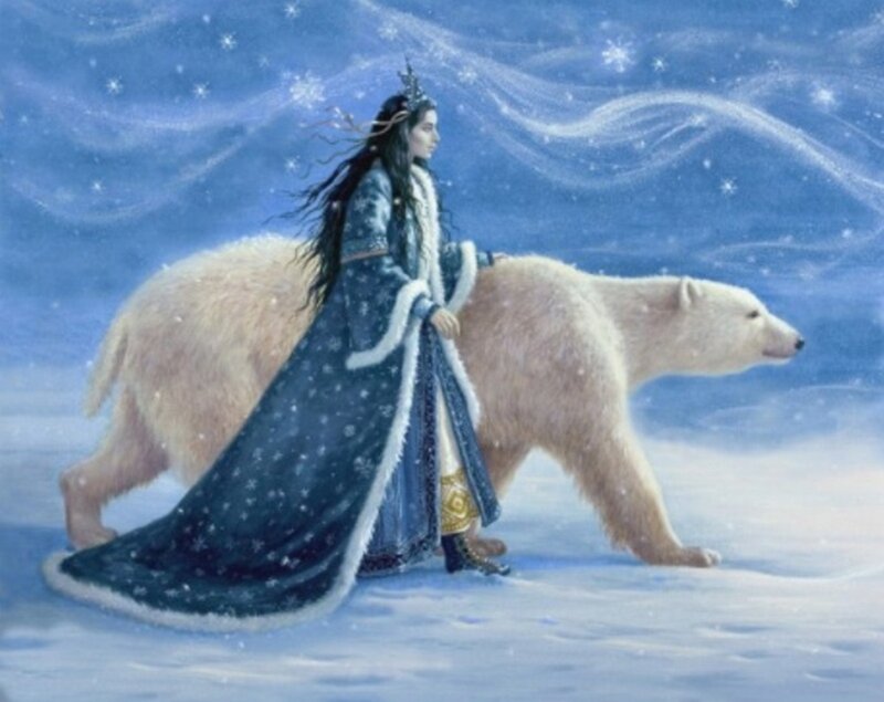 woman with polar bear in snow