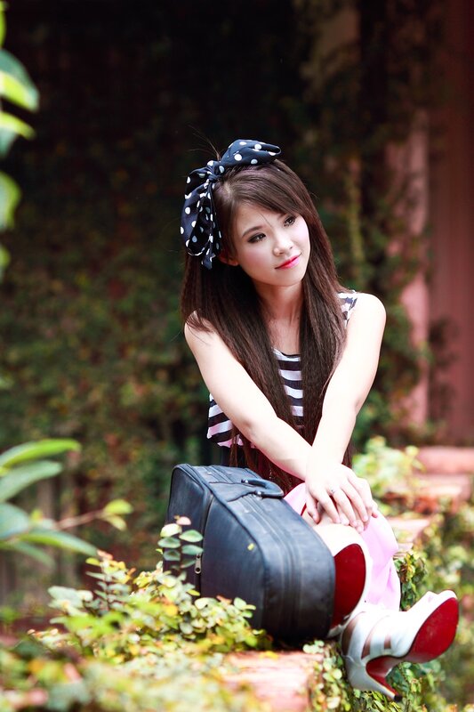 woman with polka dot bow