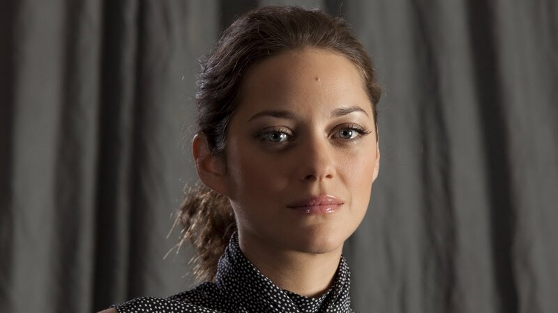 woman with polka-dot scarf