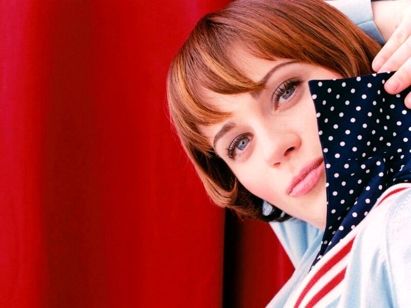 woman with polka-dot scarf