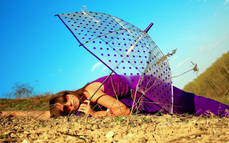 Woman with polka dot umbrella