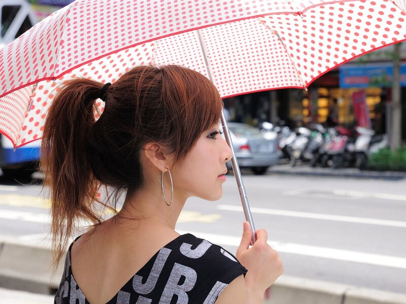 Woman with polka dot umbrella