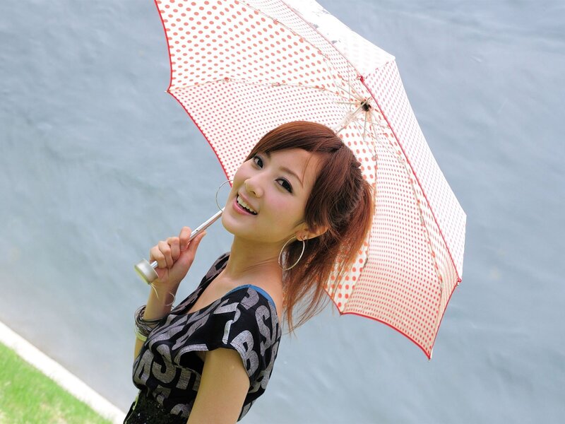 Woman with polka dot umbrella