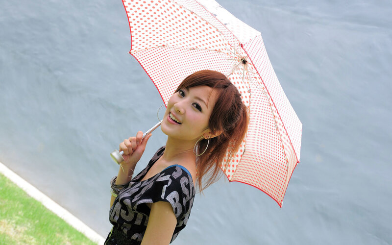 Woman with polka dot umbrella
