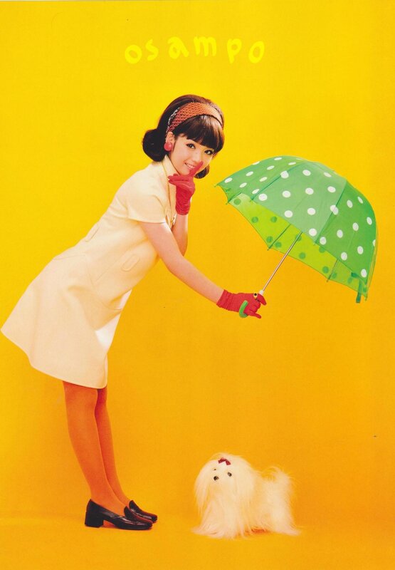 Woman with polka dot umbrella