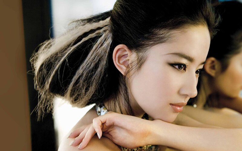 woman with ponytail looking away