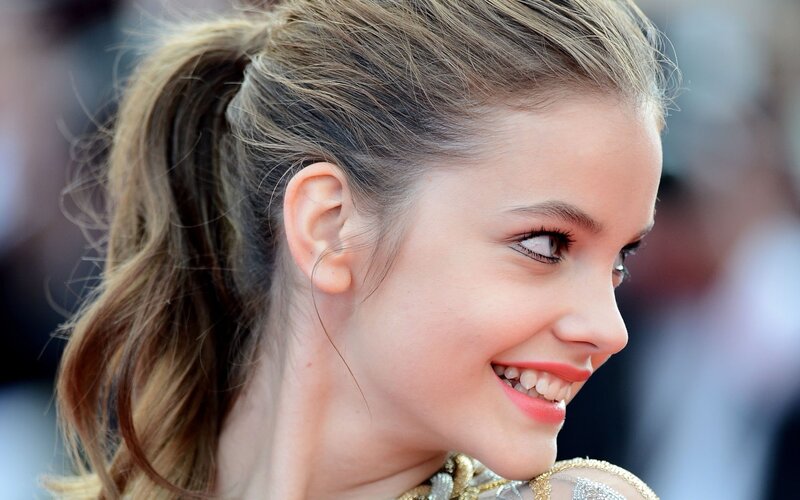 woman with ponytail smiling