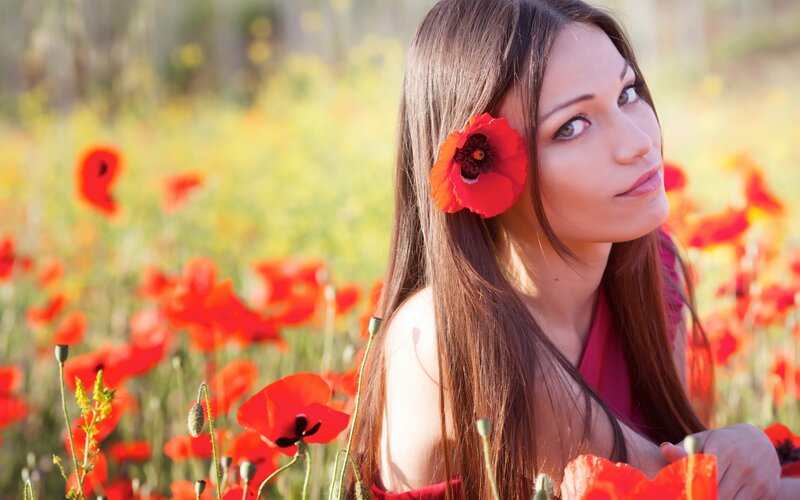 Woman with Poppy Flower