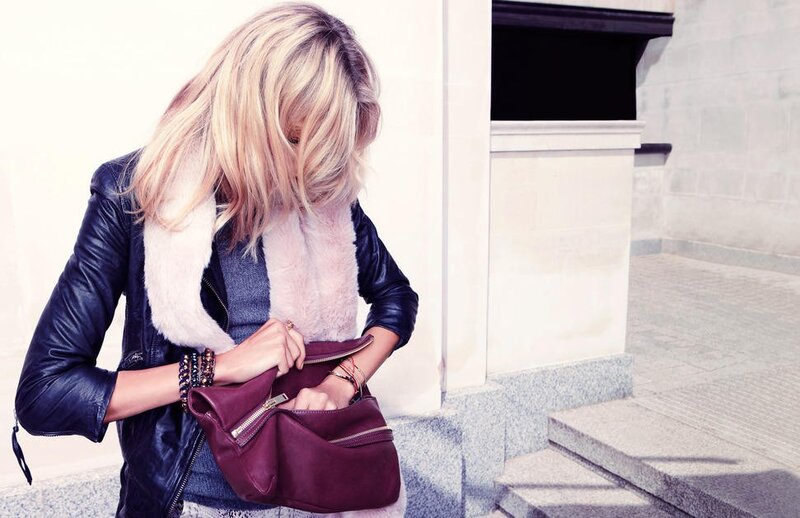 woman with purple bag