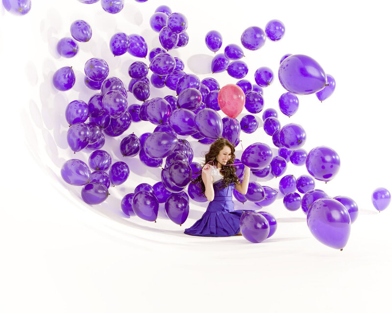Woman with Purple Balloons — Playful