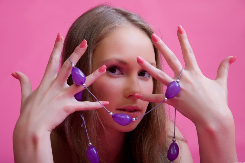 woman with purple beads