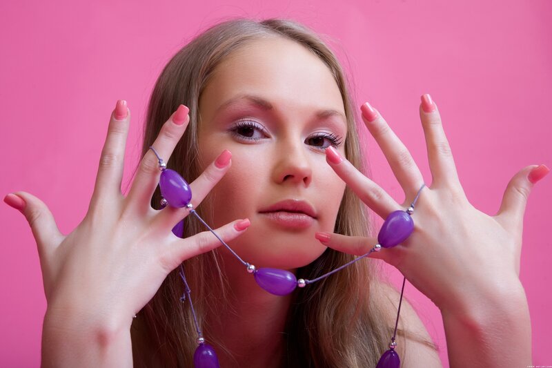 woman with purple beads