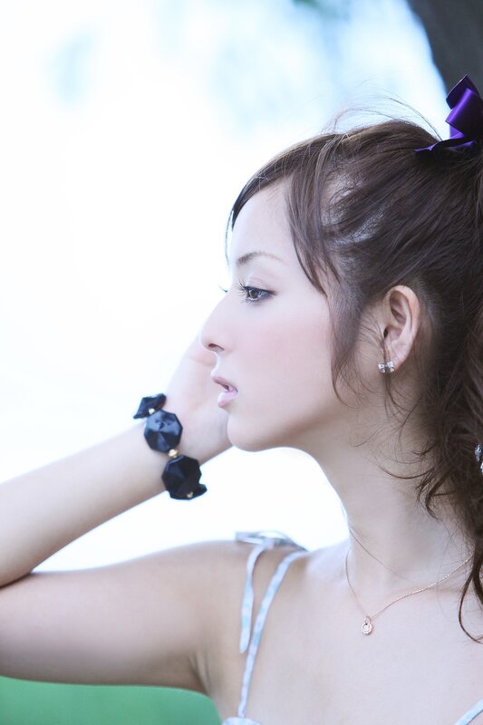 Woman with Purple Bow — White, Serene