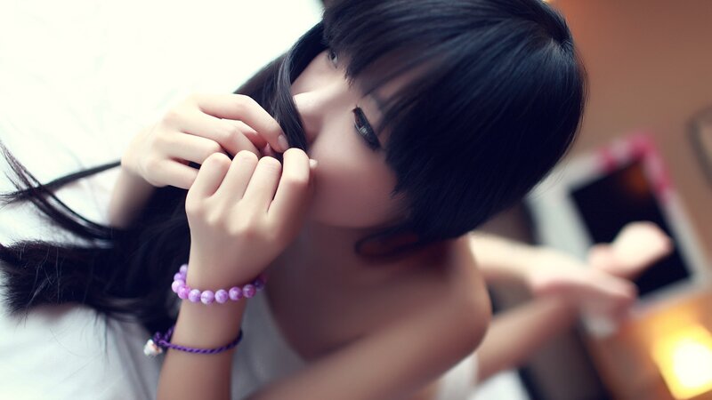 woman with purple bracelet