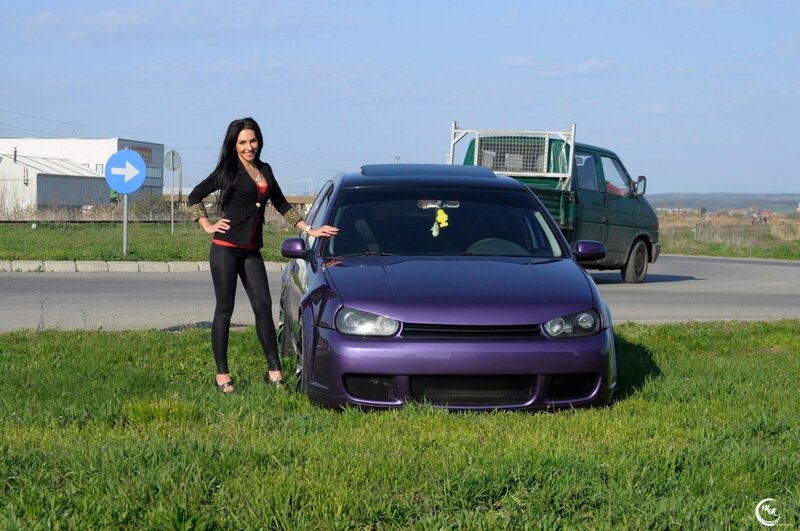 Woman with purple car