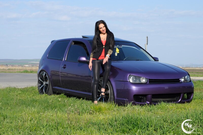 woman with purple car