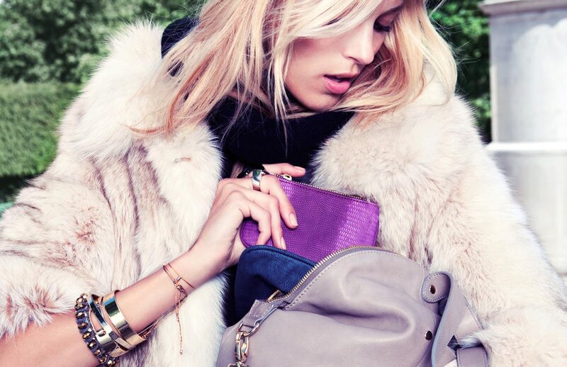 woman with purple clutch