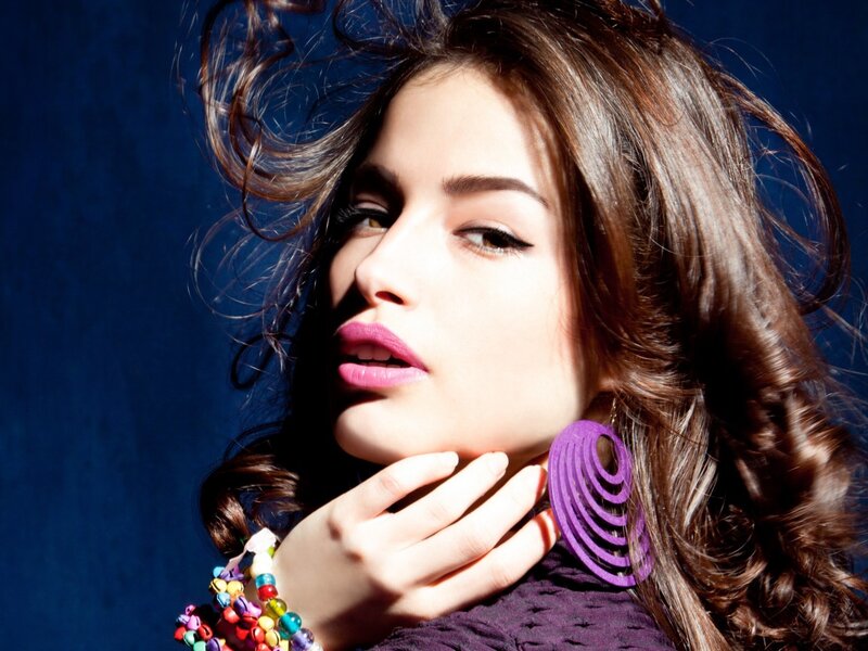 Woman with Purple Earrings — Dramatic