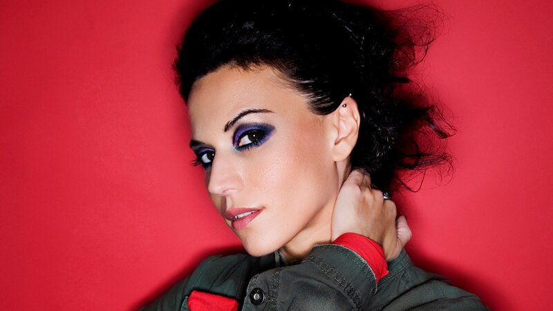 woman with purple eye makeup