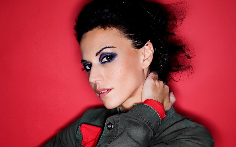 woman with purple eye makeup