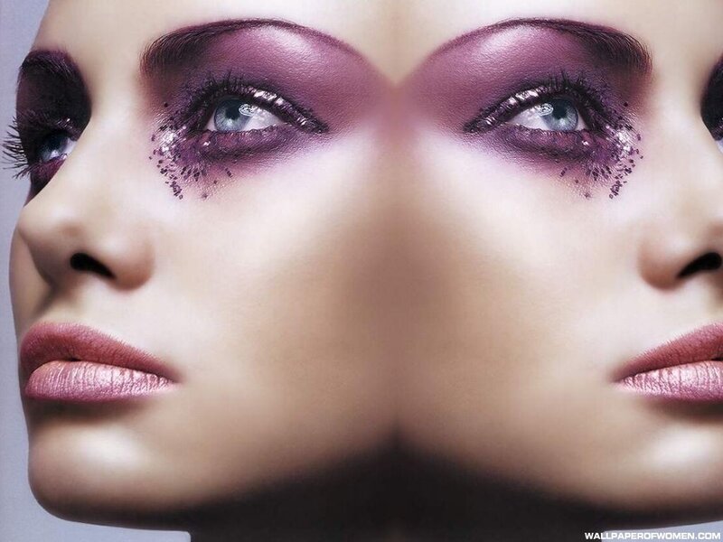 woman with purple eye makeup