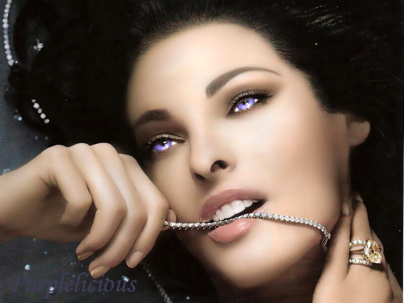woman with purple eyes and jewelry