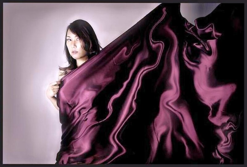 woman with purple fabric