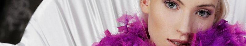 woman with purple feather boa