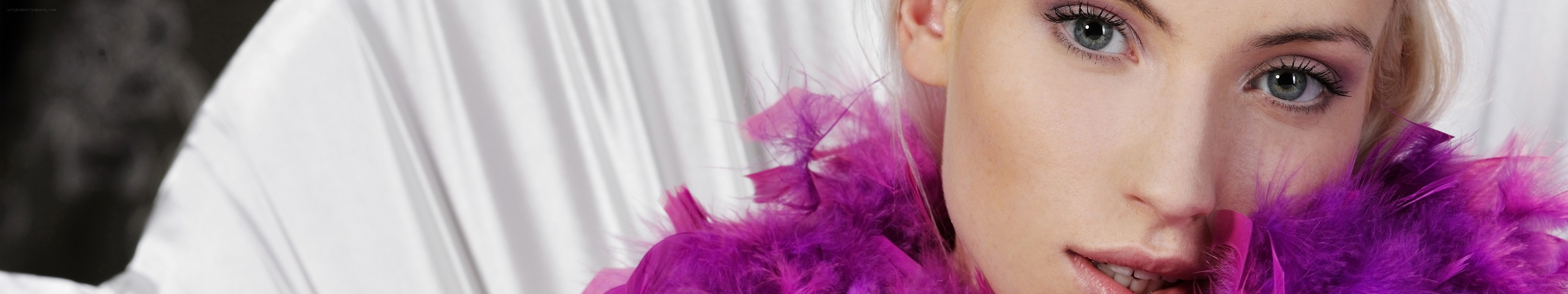 woman with purple feather boa