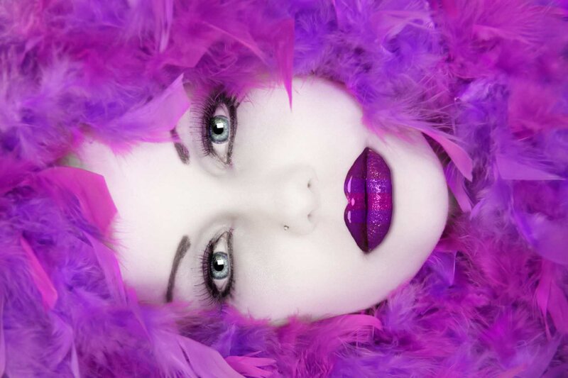 Woman with Purple Feathers — Dramatic, Photograph