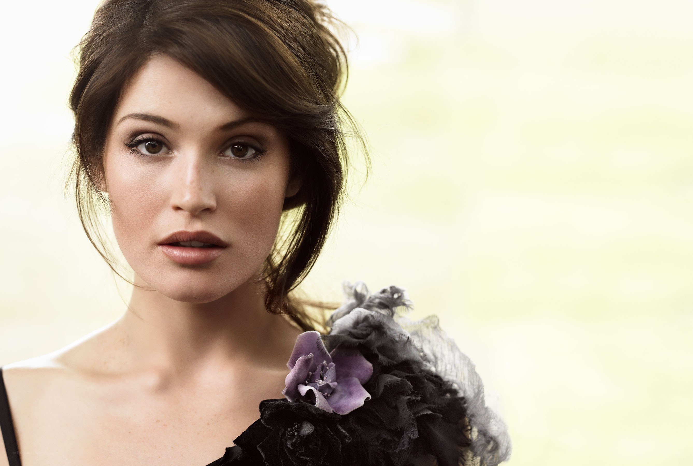woman with purple flower accessory