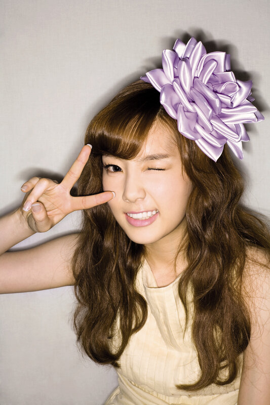 woman with purple flower headband