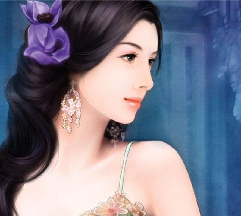 woman with purple flower in hair