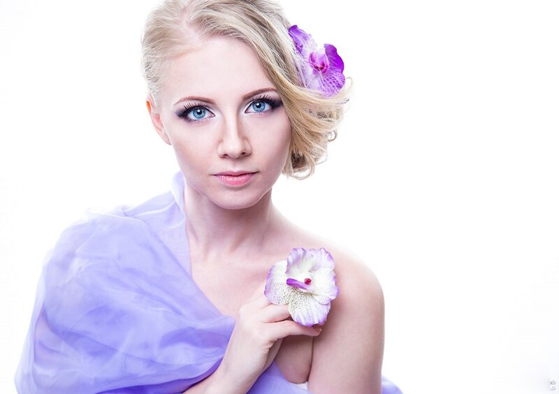 Woman with Purple Flower — Serene, Photograph