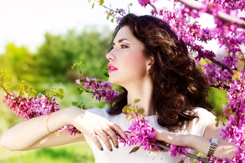 woman with purple flowers