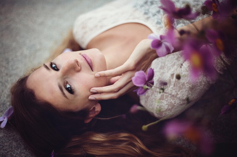 woman with purple flowers