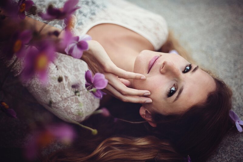woman with purple flowers