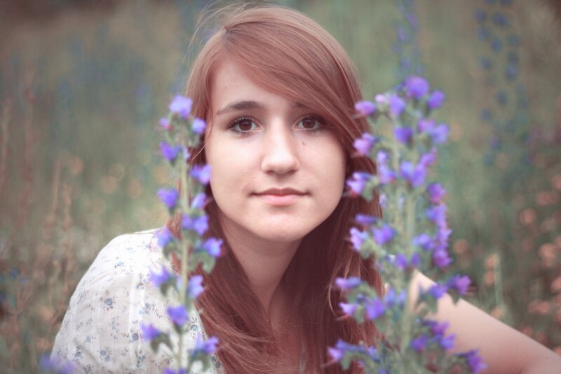 woman with purple flowers