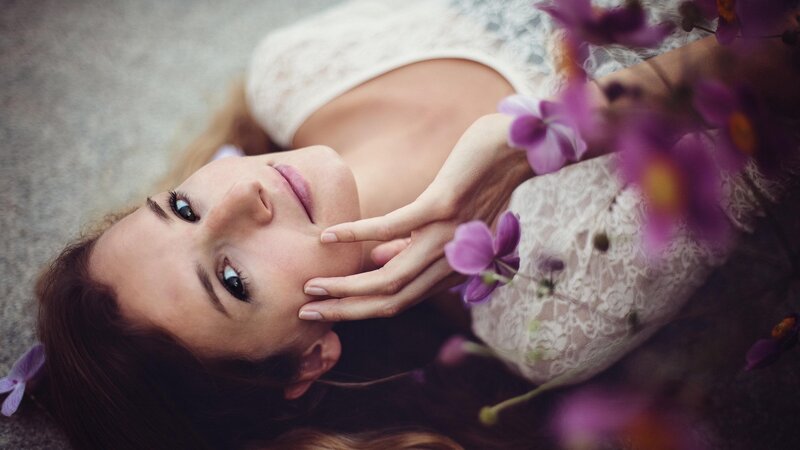 woman with purple flowers