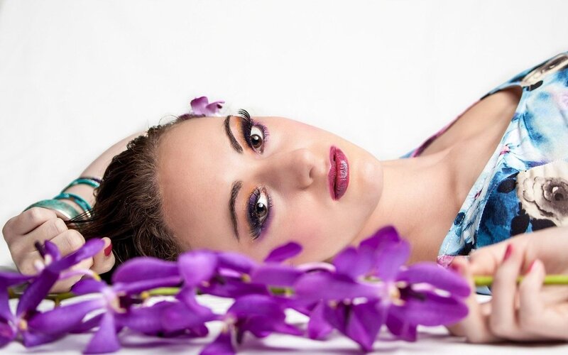 Woman with Purple Flowers — Calm, Photograph
