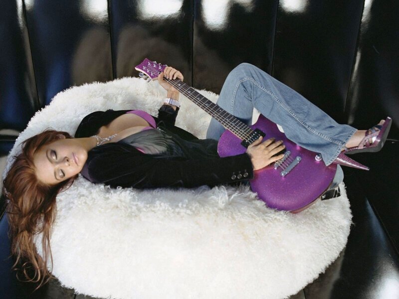 Woman with purple guitar