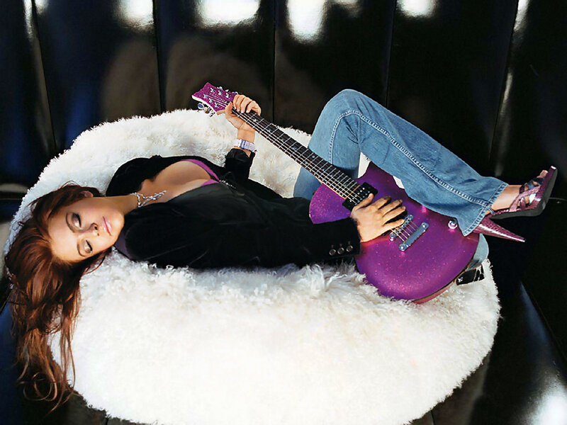 Woman with purple guitar
