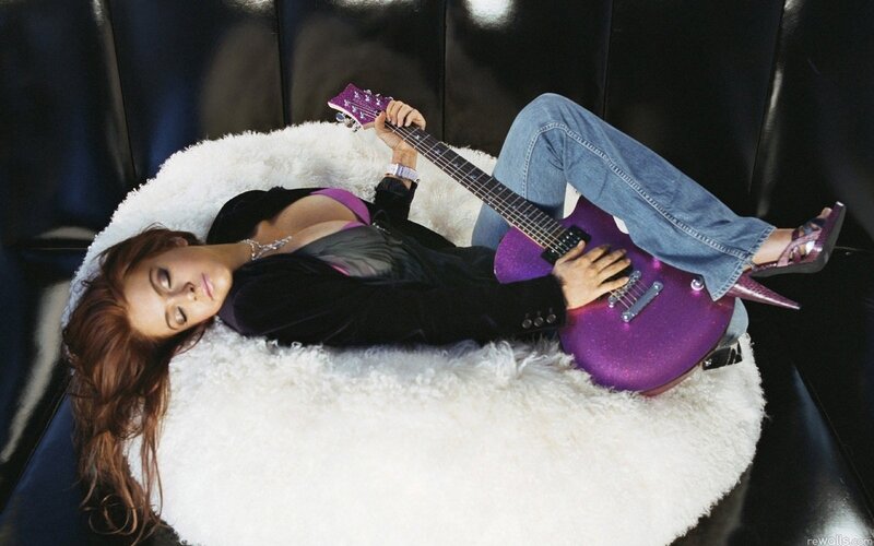 Woman with Purple Guitar — Relaxed
