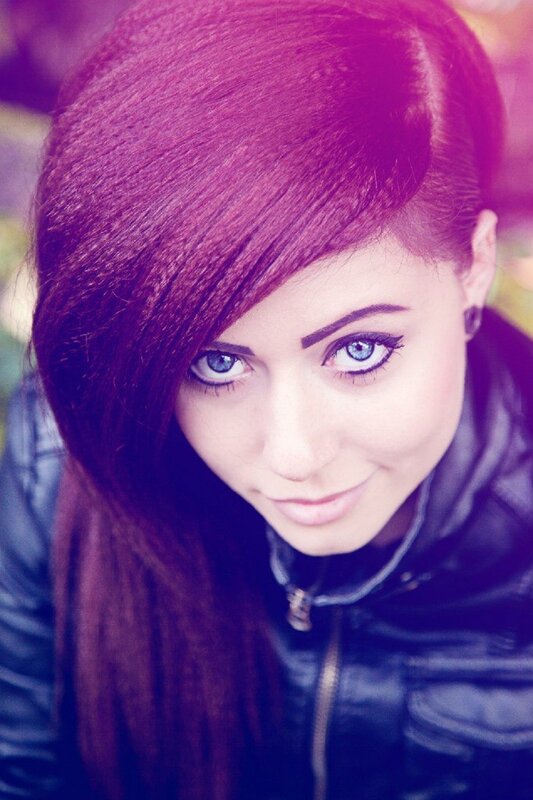 woman with purple hair and blue eyes